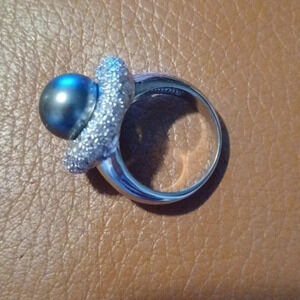 RING with faux black pearl and small sparkly stones around